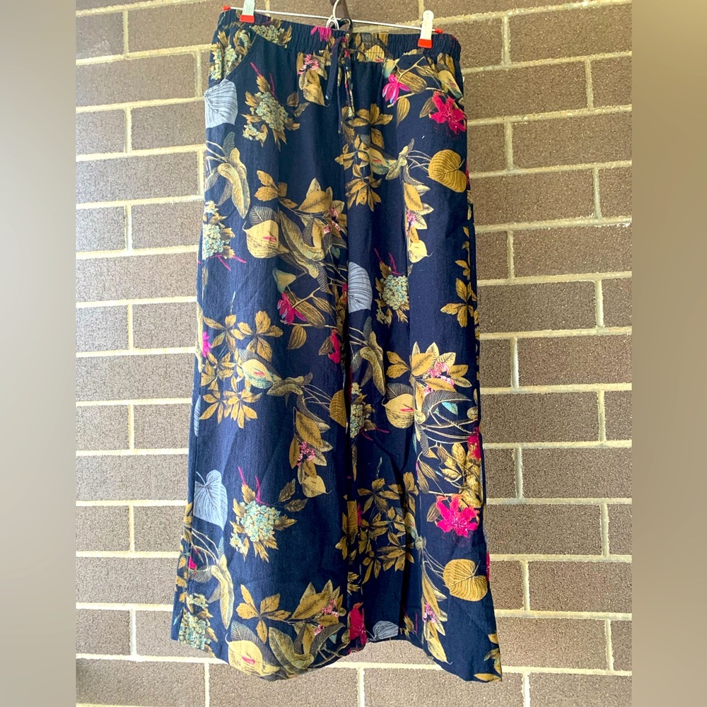 Flower and leaves blue trousers.
